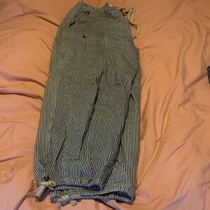 Free people striped navy and tan barrel jeans size large.  Excellent condition